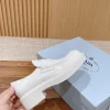 Prada Triangle Loafers